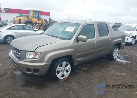 2011 Honda Ridgeline Rtl z USA, uszkodzony, nr VIN 5FPYK1F54BB009978